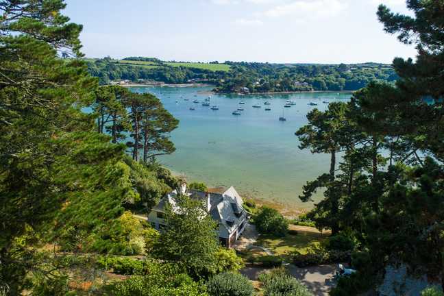 Ridiarne, a detached waterside house on the bank of the Helford River